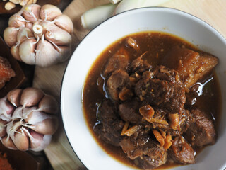 Thai northern redcurry spice pork soup and garlic 