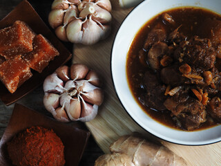 Thai northern redcurry spice pork soup and garlic 
