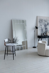 modern minimalistic interior design of light bright monochrome room with black and white furniture,...