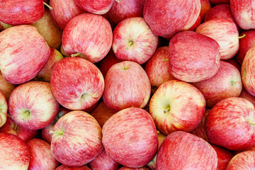 Closeup view of fresh red apples. Good harvest of fruits