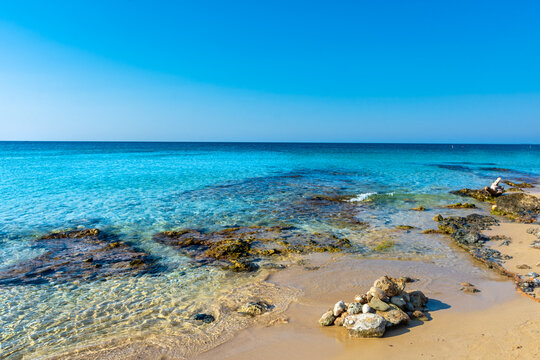 Beautiful crystal clear water in Pescoluse Beach, Salento, Apulia Italy