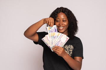 young african lady showing of some money