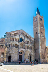 Naklejka premium PARMA, ITALY, 13 JUNE 2021 Main square of Parma with the Cathedral and the Baptistery