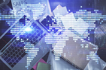 Business theme hologram drawings over computer on the desktop background. Top view. Multi exposure. Concept of international connections.