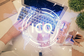 Double exposure of woman hands working on computer and blockchain theme hologram drawing. Top View....