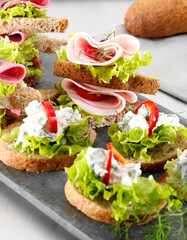 appetizers with delicatessen and fresh greens