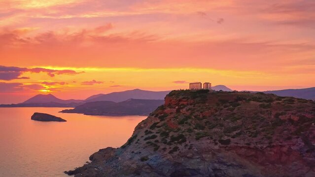 Sounion temple of Poseidon Athens Greece at sunset over Attica sea coast