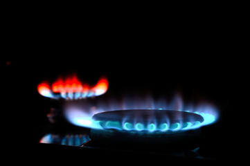 gas burner with burning gas. dark background