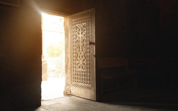 View of opened church wooden door.