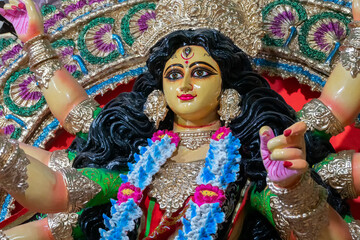 Kolkata, West Bengal, India - 7th October 2018 : Clay idol face of Goddess Durga, under preparation for 