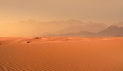 Fototapeta na wymiar Panoramic view of orange sand dune desert with orange mountains and hill - Namib desert, Namibia