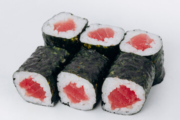 sushi rolls fish on a white background. restaurant menu