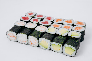 sushi rolls fish on a white background. restaurant menu