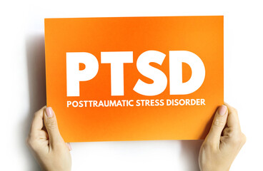 PTSD - Posttraumatic Stress Disorder acronym text on card, medical concept background