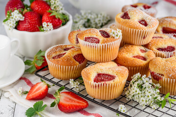 Homemade strawberry muffins or cupcakes.  Fruit  summer baking. Selective focus
