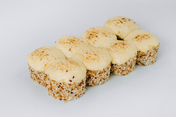 baked sushi rolls on a white background. restaurant menu.
