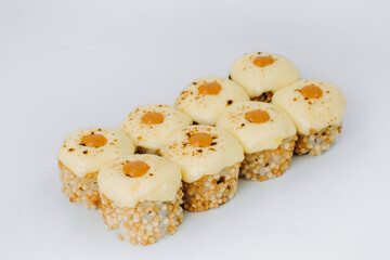 baked sushi rolls on a white background. restaurant menu.