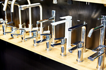 Modern water faucets in store