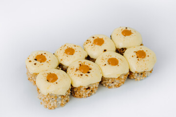 baked sushi rolls on a white background. restaurant menu.