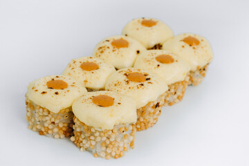 baked sushi rolls on a white background. restaurant menu.
