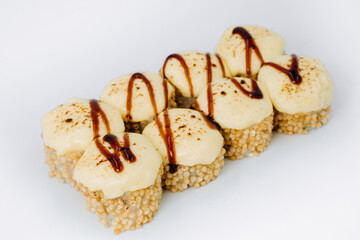 baked sushi rolls on a white background. restaurant menu.