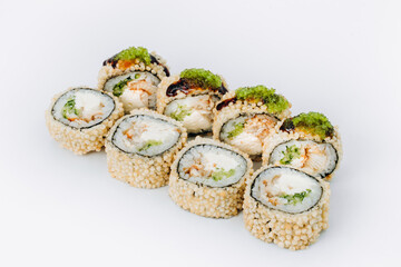 rolls with salmon cheese and avocado in sesame seeds on a white background