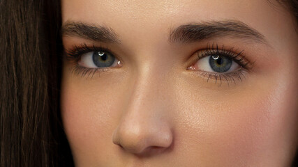 Closeup female eyes with bright make-up, great shapes brows, extreme long eyelashes. Celebrate...