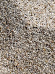 Decorative granular grit floor or wall pattern for use as background texture in closeup