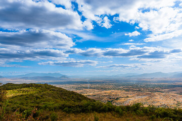 Fototapeta na wymiar View of the valley of Oaxaca from the archaeological zone of Monte Alban sky with clouds and clear