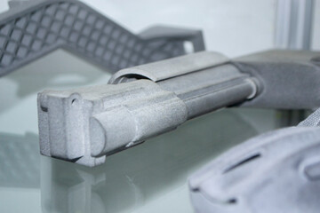 Model printed on 3D printer. Gray object printed on 3D printer made of plastic close-up. Surface 3D...