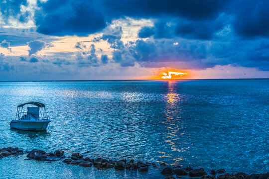Colorful Sunset Cloudscape Boat Breakwater Blue Water Moorea Tahiti