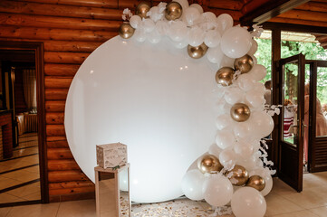 Wedding arch made of white balloons. Children's holiday celebration. balloon arch