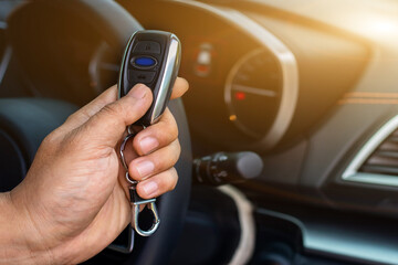 Auto mechanic or driver checks steering and gear system and start system before driving at service...