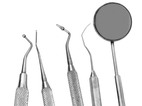 Mirror and dental tool to remove tartar in the dental clinic