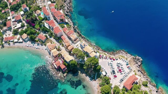 Idyllic travel resort town in Greece. Aerial view of Assos hotels in Kefalonia