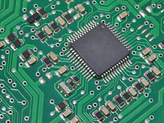 microchip and many transistors  of an electronic board