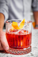 bright colored alcoholic cocktail on a bar background