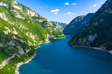 Fototapeta na wymiar Montenegro. Durmitor National Park. Pivo lake. Canyon of the Tara River. Aerial view. Intense water color