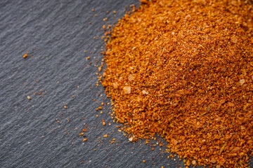 svanetian salt on a black stone background