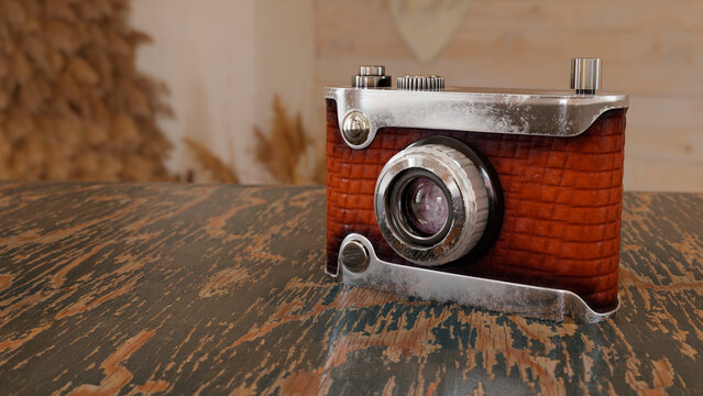 A Retro camera on wooden table in lovely brown design. Designed to revive old 35mm vintage cameras from the 70s and 80s.