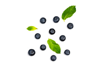 Fresh blueberries with leaves, berry isolated on white background, top view flat lay image.