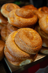 Challah bread sprinkled with sesame seeds and baked into round loaves for the festive two-day celebration of the Jewish New Year of Rosh Hashana in Israel.