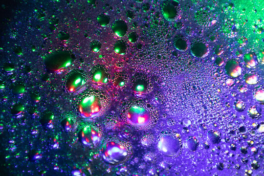 Abstract colourful macro bubbles in oily water