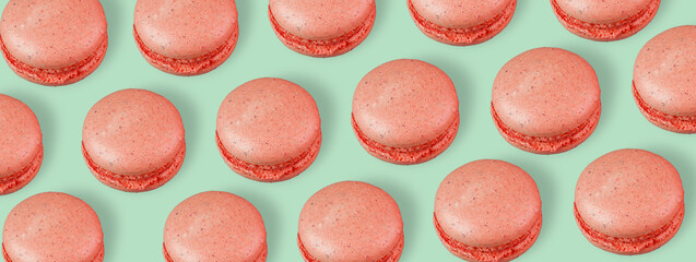 Bright macaroons on a colored background