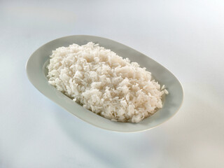 cooked rice pilaf served on white plate