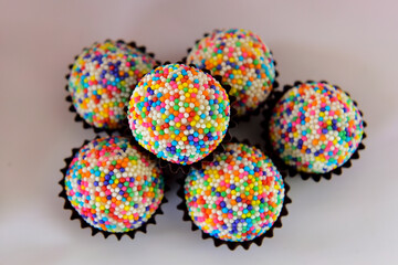Fototapeta na wymiar chocolate candies in a bowl, condensed milk candy balls, candy balls