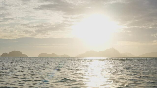 Glowing Sunset Over Sea By Corong Corong Beach