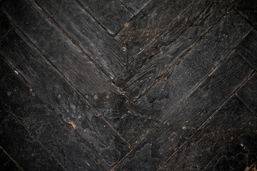 interesting striped old black parquet pattern mounted at an angle, texture for your floor design