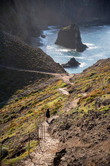 Woman walking on a rocky trail in Madeira