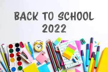 Back to school 2022. Different stationery on white background, flat lay
